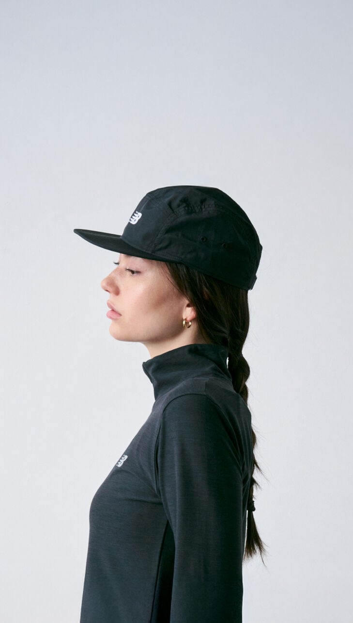 Side shot woman wearing black hat